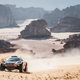 The Andretti United Extreme E car racing at the Desert X Prix